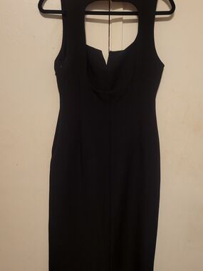Classic Black Sleeveless Midi Dress with Cutout Neckline